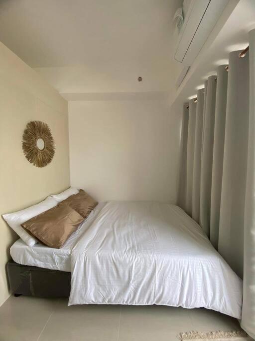 1BR unit in South Residence Las Pinas with Wifi & Netflix photo