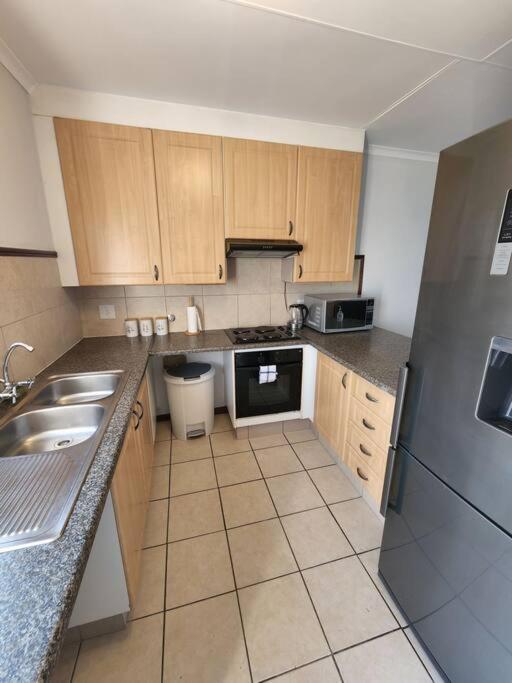 Elegant 2 bed apartment next to Gautrain Centurion photo