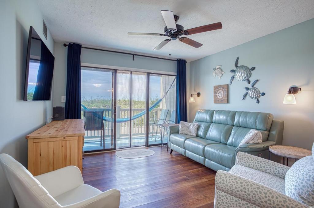BEAUTIFUL BEACHFRONT-Oceanfront First Floor 2BR 2BA Condo in Cherry Grove, North Myrtle Beach! RENOVATED with a Fully Equipped Kitchen, 3 Separate Beds, Pool, Private Patio & Steps to the Sand!, Myrtle Beach