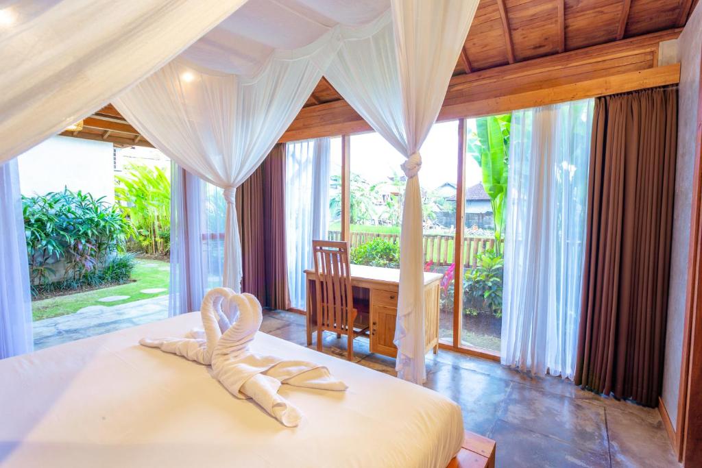 Kubu D'Carik Villa & Bungalow by ecommerceloka photo