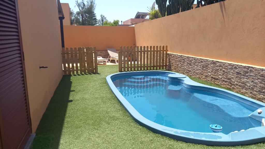 Casa Pitaya, acogedora, con piscina, fibra óptica, La Oliva