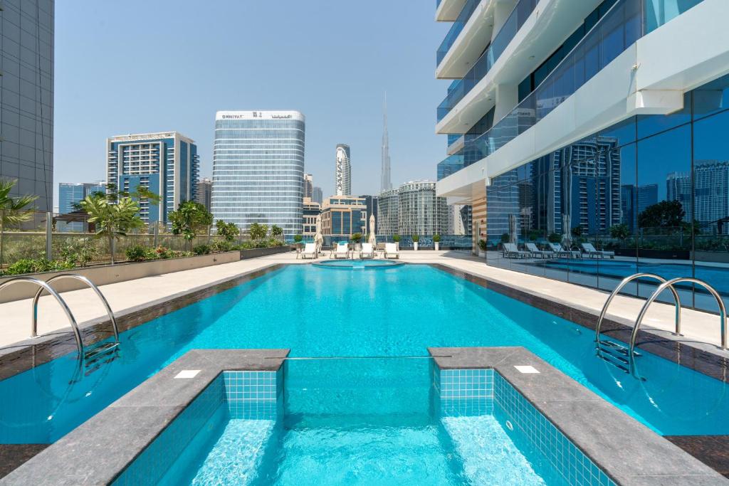 Exclusive GLOBALSTAY Apartments in Business Bay Free Parking & More!, Dubaj