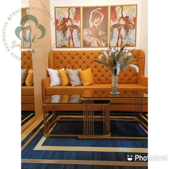 Simply COZY at Trees Residences 1 Br with Balcony photo