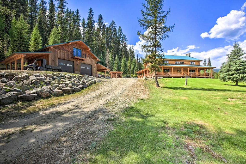 Waterfront Log Home with 95 Acres on Yaak River, Troy