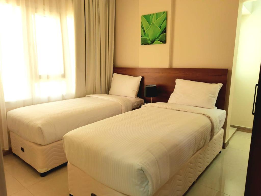 Grand Orchid Hotel Apartment photo