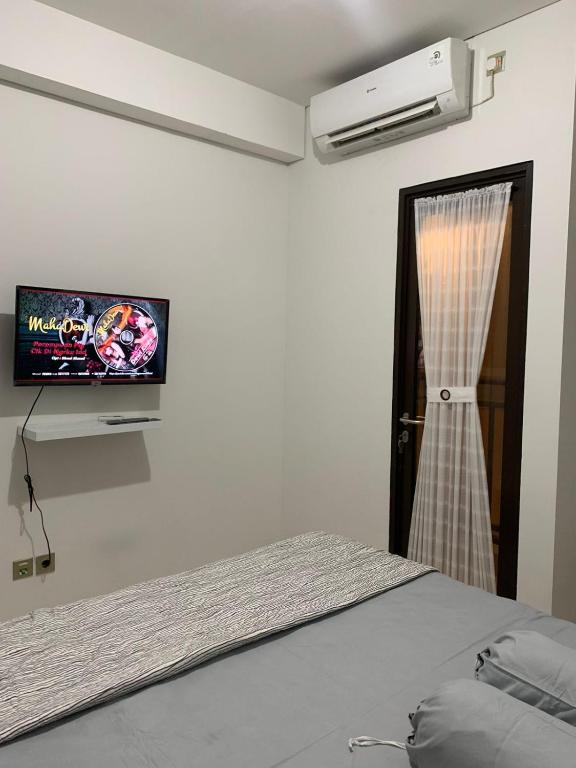 Apartement Studio Transpark CIbubur by Amelia photo