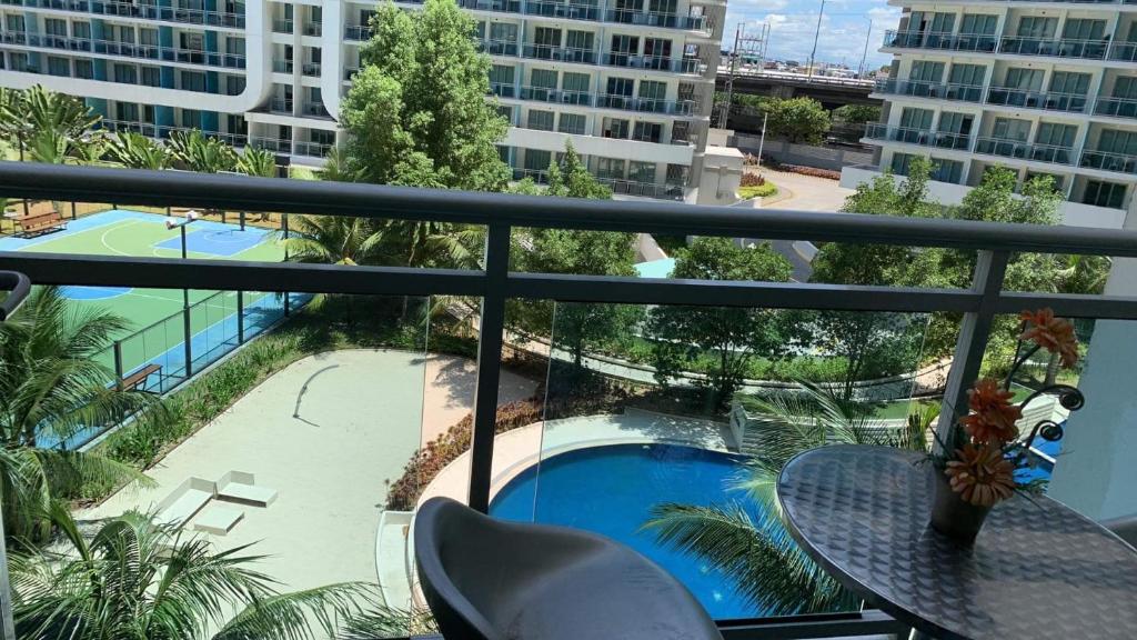 AZURE A6 beachpool with Balcony Wifi near mall airport photo