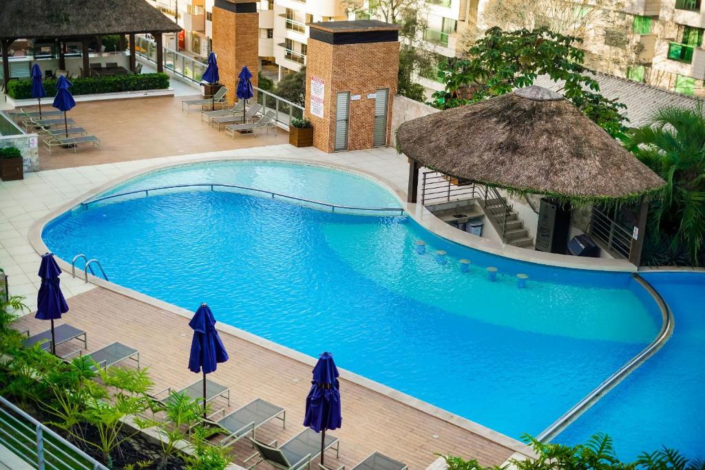 Punta Blu 102v5 - Excelente apartamento em condomínio de luxo no centro de Bombinhas - Vista para o mar - Piscina - (Consultar serviços de roupa de cama e banho), Bombinhas