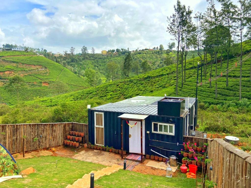 container house- Private estate cottage — Hotel in Ooty