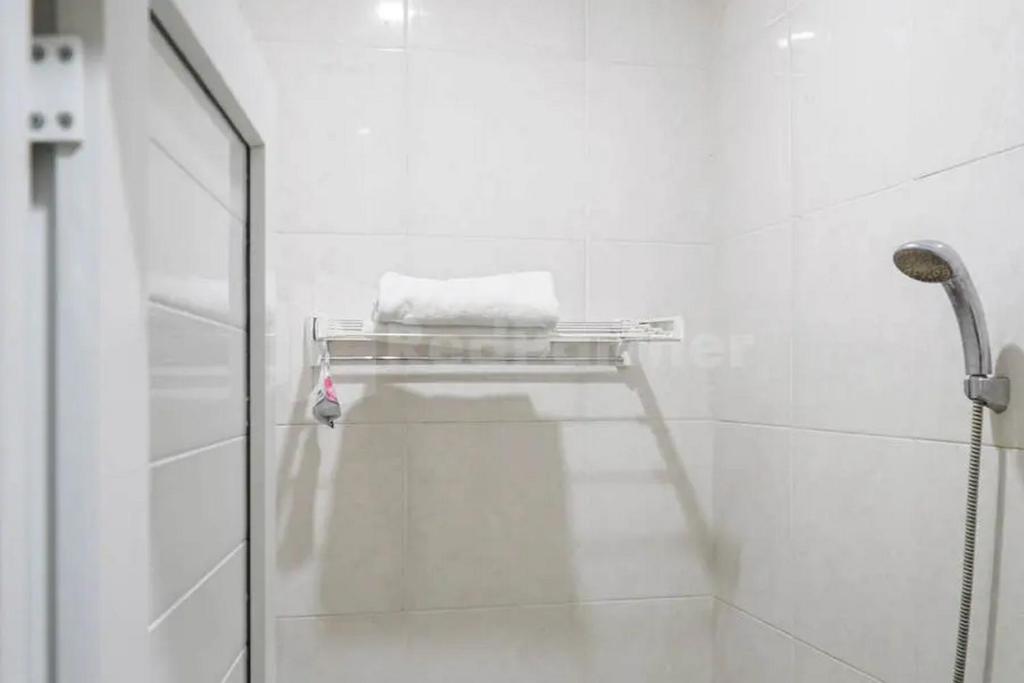 Deli Homestay near DeliPark Mall Medan RedPartner photo