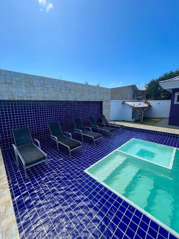 casa de praia com piscina e hidromassagem photo