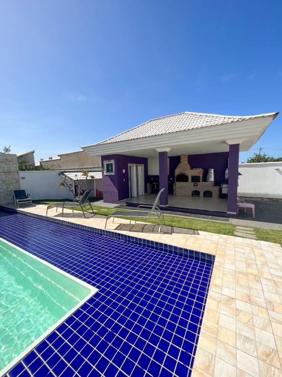 casa de praia com piscina e hidromassagem photo