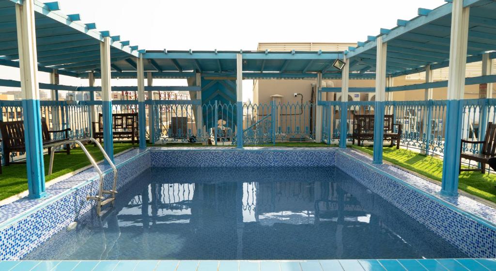 Swimming pool, BOONMAX HOTEL in Dubai