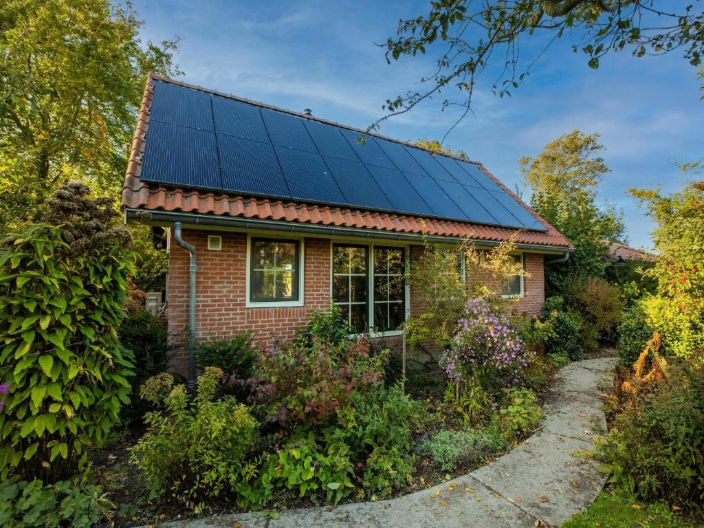 Tasteful holiday home in Wijnaldum with garden