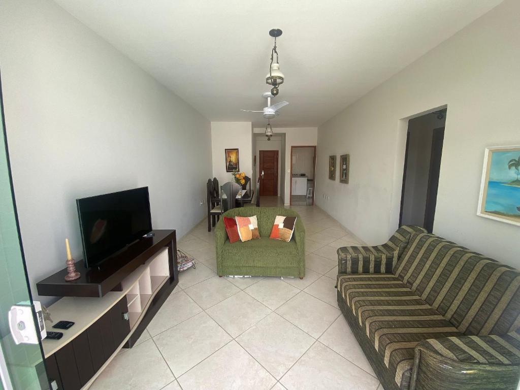 Apto aconchegante no Centro - WIFI - 2 Quartos - Garagem - TV Smart - Cozinha equipada - Ar condicionado - Pet Friendly