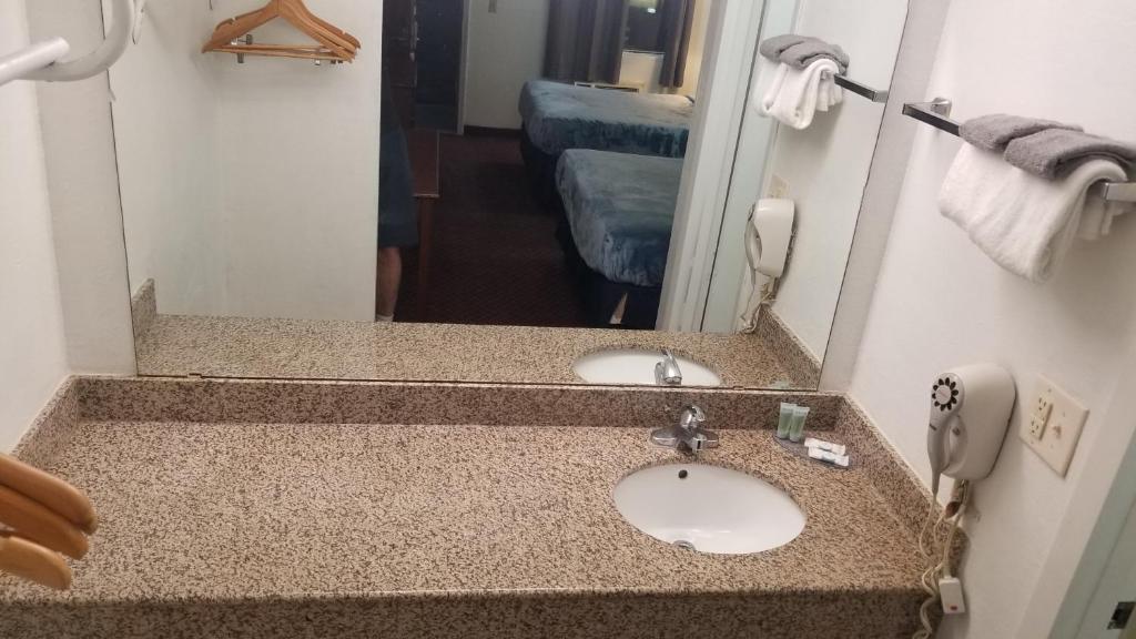 OSU King Bed Hotel Room 110 Booking photo