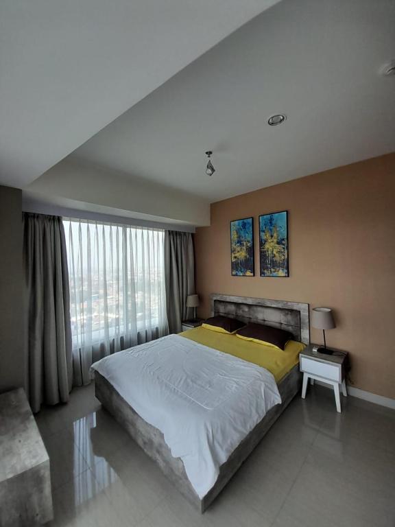 Grand kamala lagoon by andara properti photo