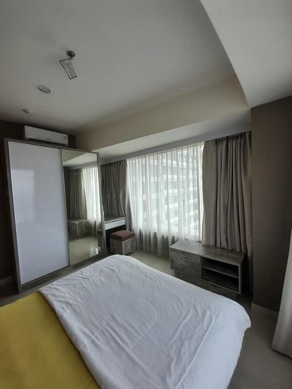 Grand kamala lagoon by andara properti photo