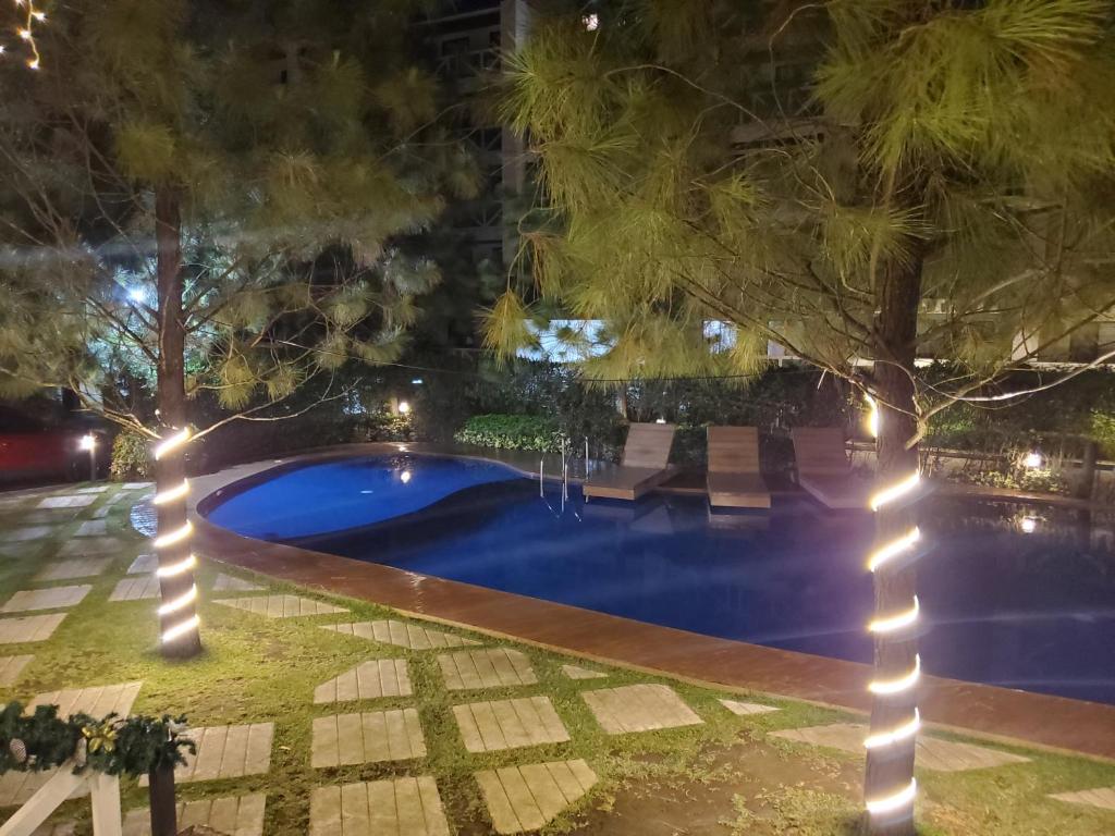 Cozy Condo at Pine Suites Tagaytay with WIFI Netflix & Pool photo