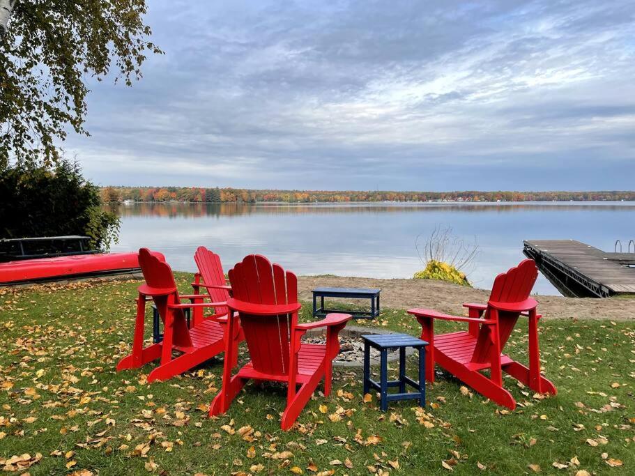 Lazy Bear Lakehouse lakefront rink w/ ice fishing