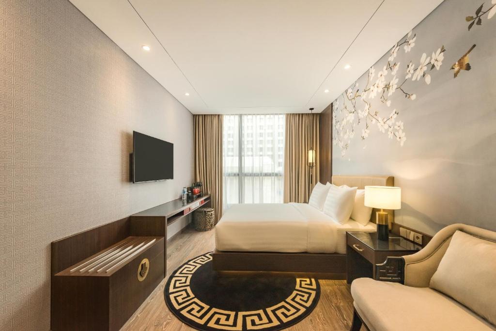 애슐리 탕 멘텡 자카르타의 깔끔하고 편안한 객실