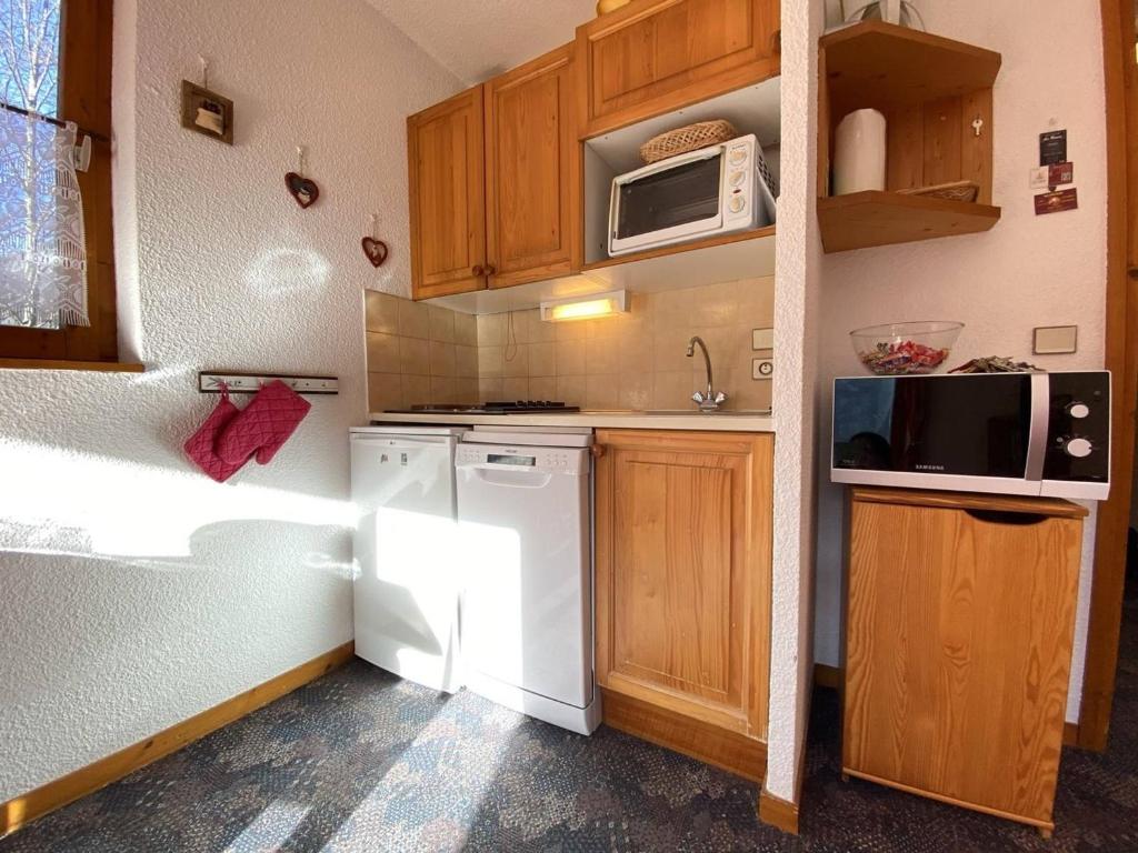 Studio cabine à Praz Sur Arly - Balcon, proche pistes et centre - 4 pers, parking, casier ski - 4