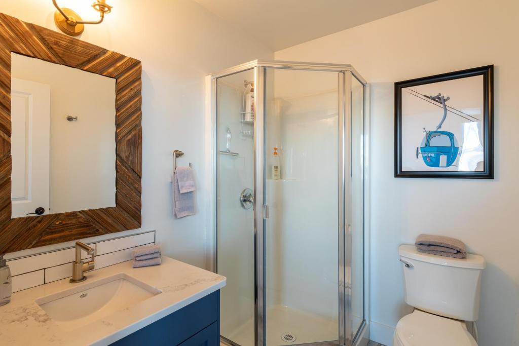 Fully Renovated Ski-in/out Loft with Private Hot Tub! photo