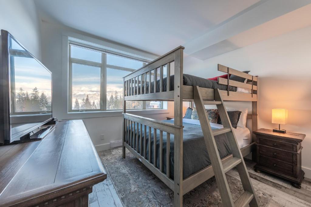 Fully Renovated Ski-in/out Loft with Private Hot Tub! photo