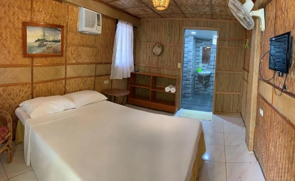 Bamboo House Beach Lodge & Restaurant，位于波尔多·格尼拉的酒店