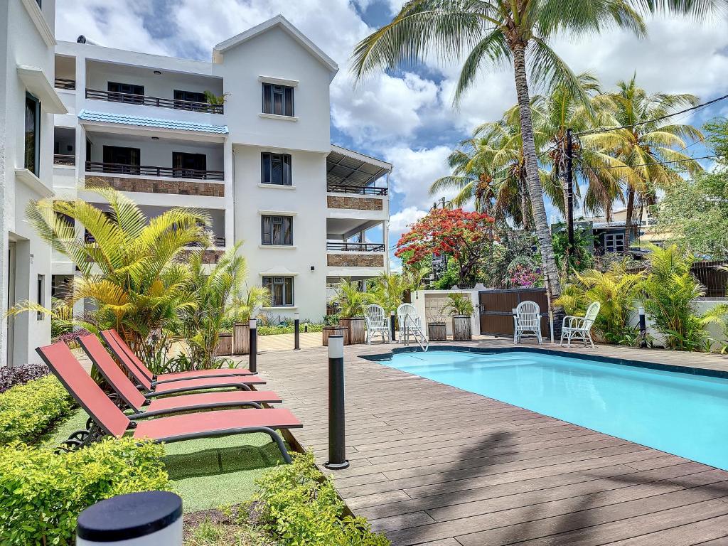 Sunkissed - Brand New Beach apartment located 50m from beach, Flic-en-Flac