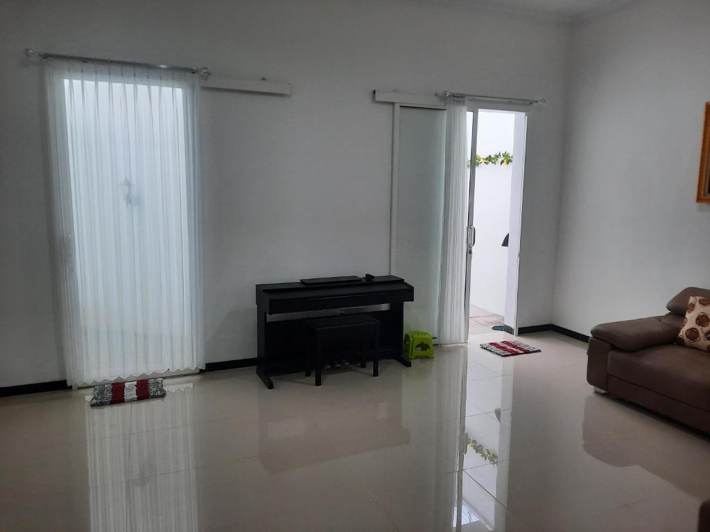 Rumah 155 m² dengan 3 kamar tidur dan 2 kamar mandi pribadi di Candi (Diamond Town House 9A)