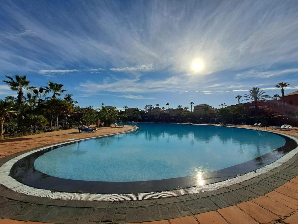 MY PRETTY HOME - Lovely and spacious surrounded by tropical gardens - private covered and uncovered terrace - pool - parking - FREE FIBRE OPTIC INTERNET, Corralejo