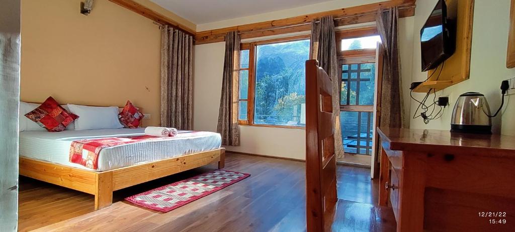 Tirthan Grand Riverside photo