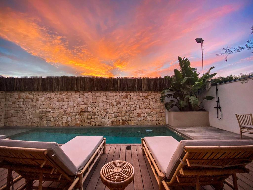 S´Estancia Suites — Swimming pool in Es Mercadal, Balearic Islands