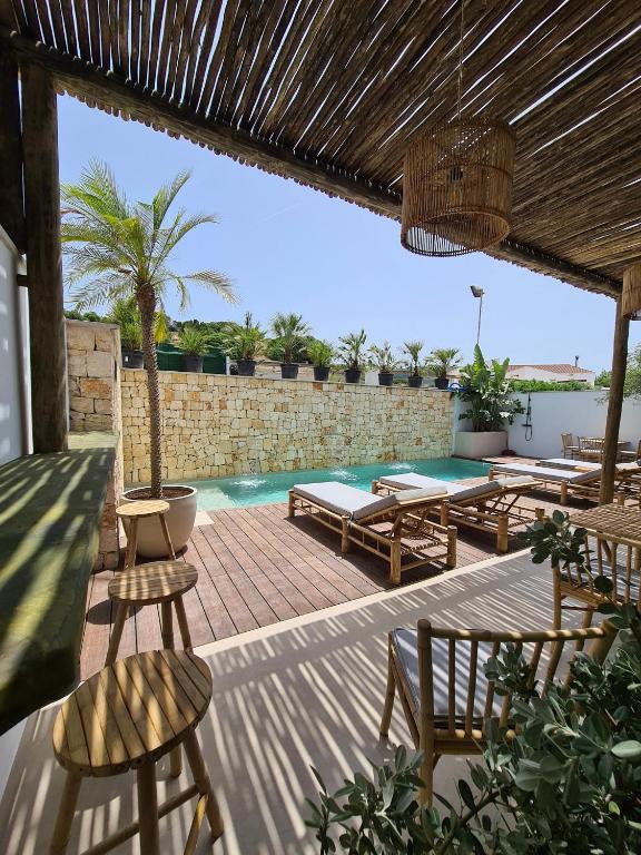S´Estancia Suites — Swimming pool in Es Mercadal, Balearic Islands