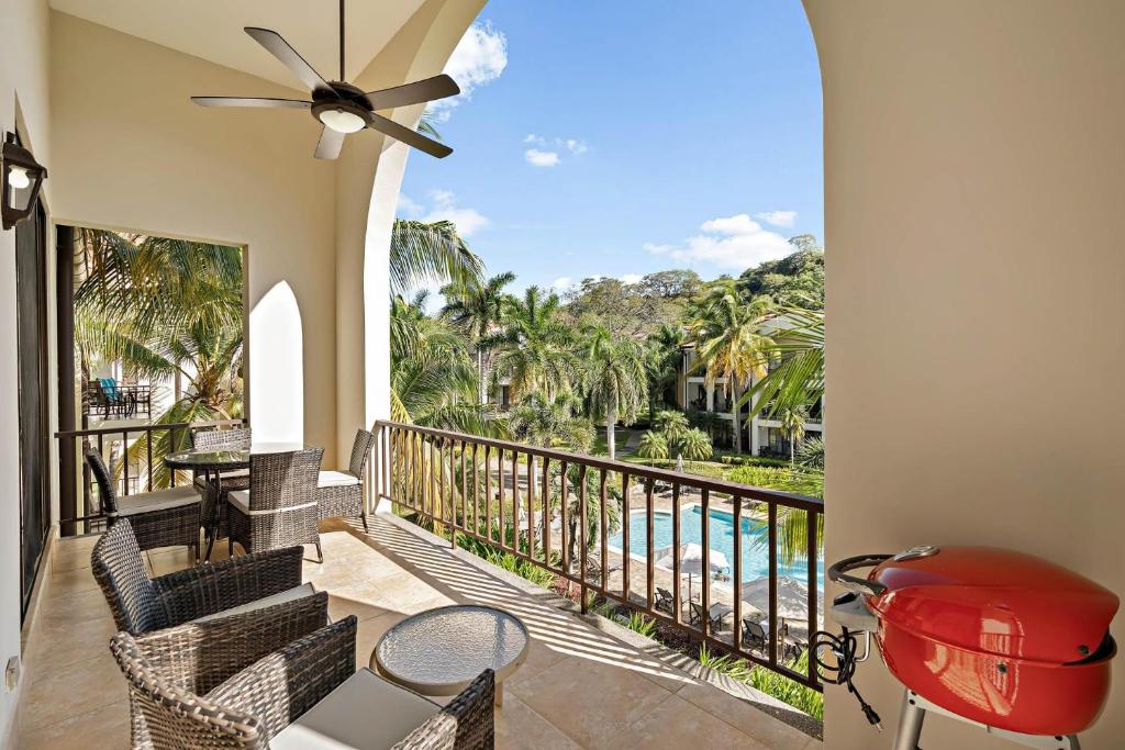 Colorfully decorated 3rd-floor unit overlooking pool at Pacifico in Coco