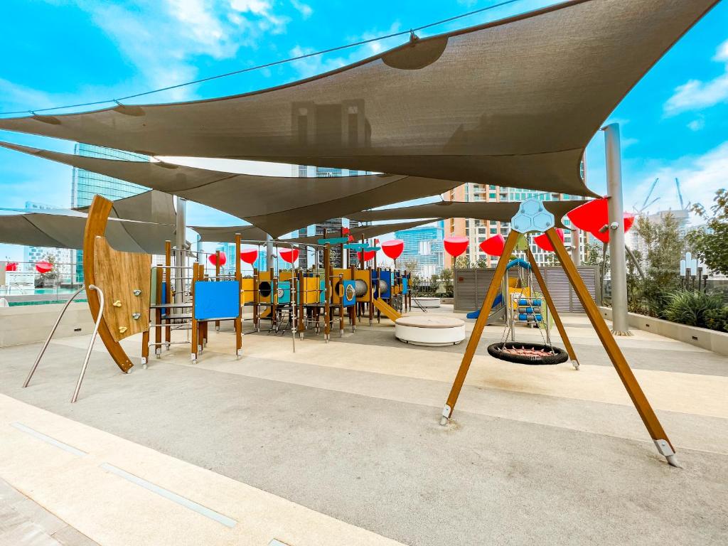 FAM Living - Modern Apartments in MAG 318 with a Stunning Pool, 5 mins to Burj Khalifa photo