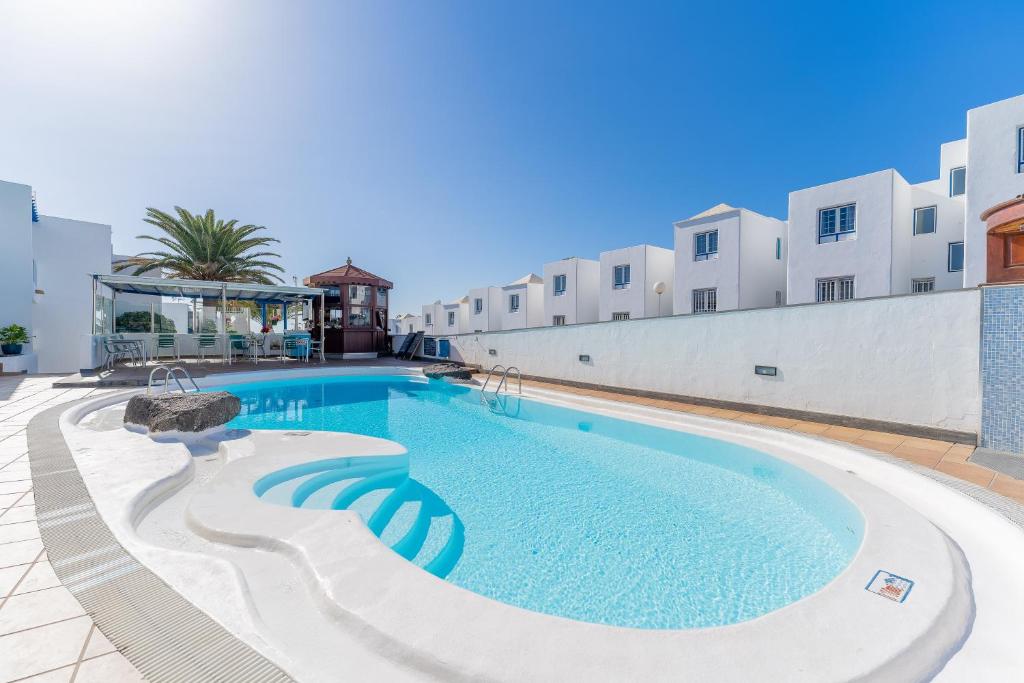 Apartamentos Isla de Lobos - Adults Only — Swimming pool in Puerto del Carmen, Canary Islands