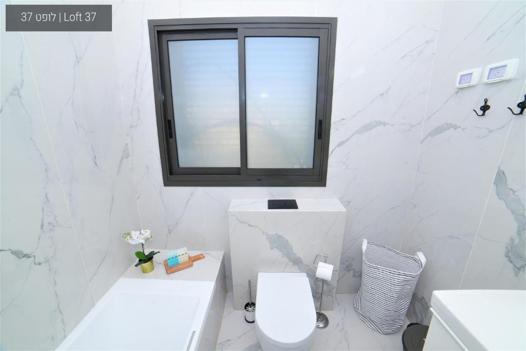 YalaRent La Mera- Duplexes & Lofts with Sea of Galilee views photo