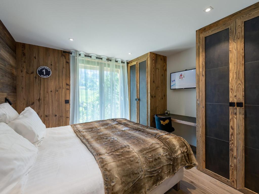 Chalet Luxe 12 Pers. Face aux Pistes avec Skiroom, Garage, Salle de Sport et Services Inclus - 4