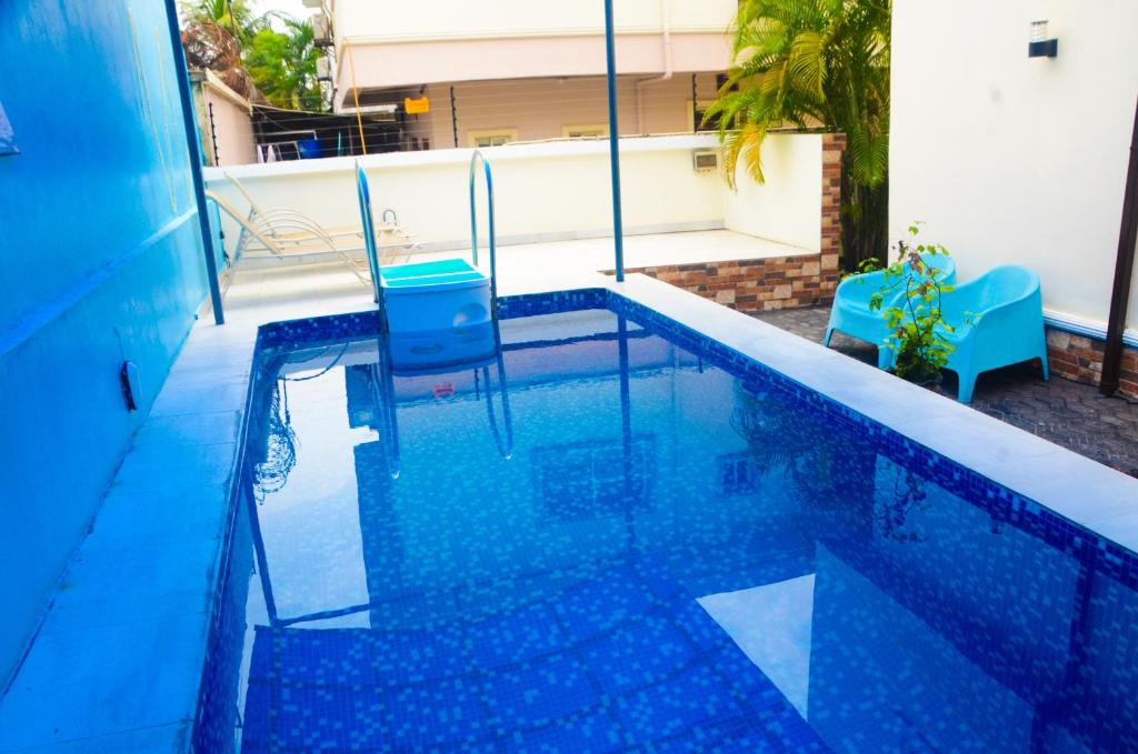 J Gibson suite, Lekki