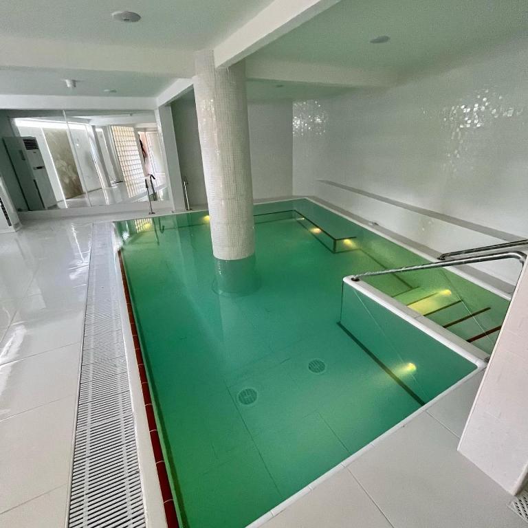 Hotel Oasis Park Splash — Swimming pool in Calella, Catalonia