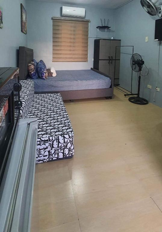 Lucena Meg's Studio Apmnt VIP rm-Near SM-Wifi — Hotel in Lucena
