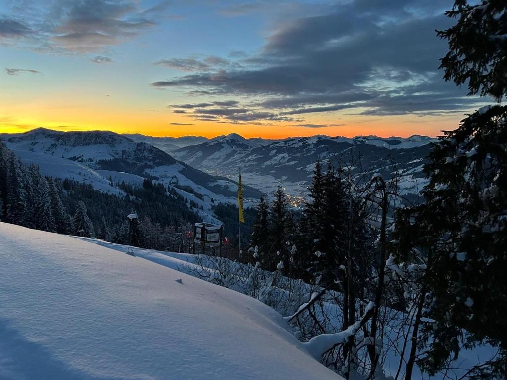 Hocheckhuette On Top of the Kitzbuehel Hahnenkamm Mountain photo