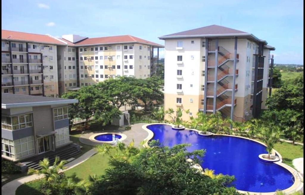 Amaia Steps Nuvali fully furnished unit with swimming pool view near Carmelray Pitland photo