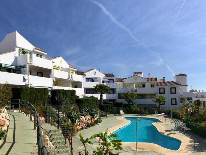 Apartment with garden and communal pool - 1
