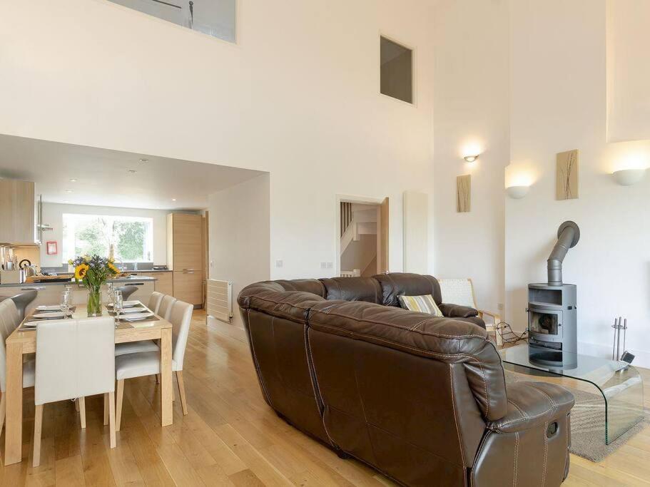 Cotswolds Lake side home with luxury spa Swallows Nest,Lower Mill Estate, Lakeside home and spa with a Harry Potter cupboard under the stairs, Somerford Keynes