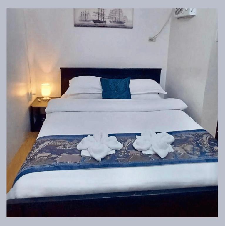 Estien’s cozy condo to stay with kitchen photo
