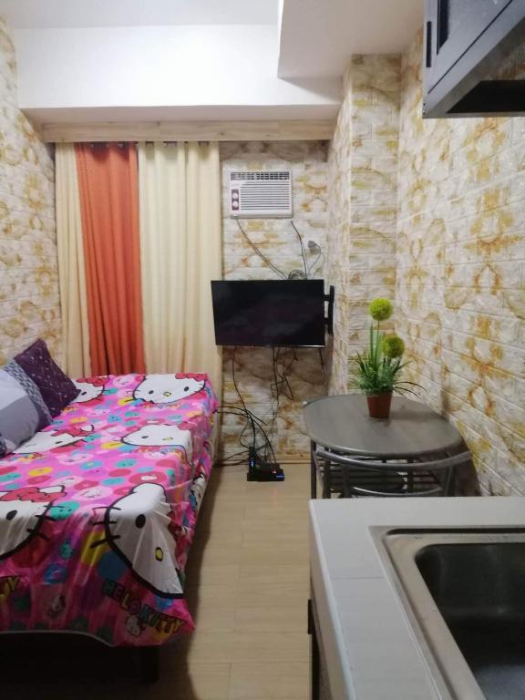 Quezon City Condotel at Mplace South Triangle photo