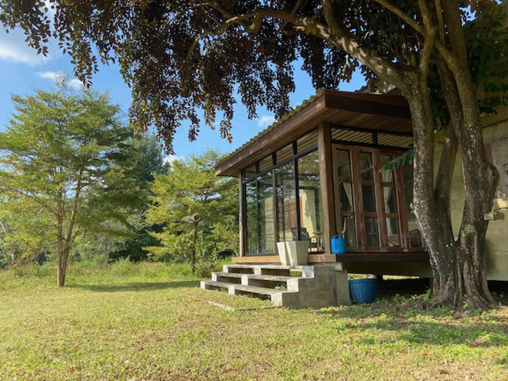 House surrounded by nature near Tao Garden